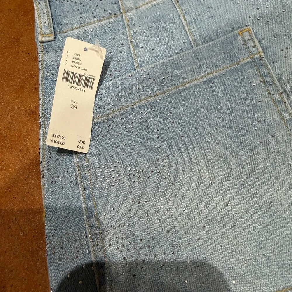Anthropologie Light Blue Wide-Leg Full length Rhinestone Jean. Check video